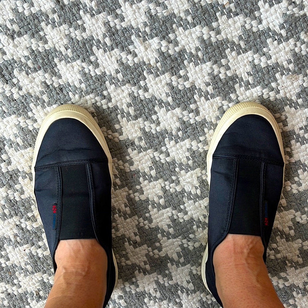 Black slip on sneakers